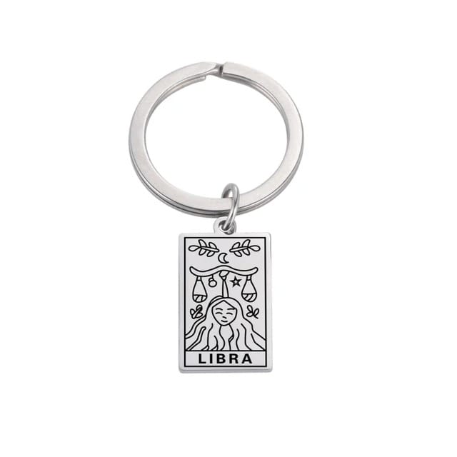 srebrny-metalowy-breloczek-znak-zodiaku-waga.jpeg