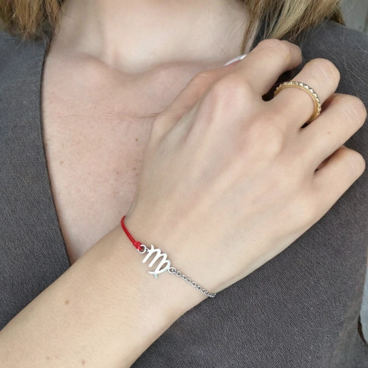 Bransoletka Wagi na nadgarstku.png
